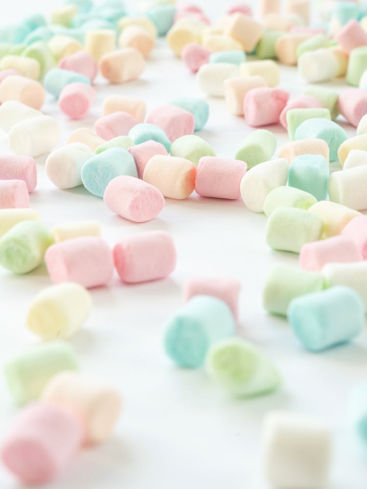 Pastel colors pink, green, baby blue and white marshmallows - great for a kids room or kitchen -food photography by Christa Stroo Photography