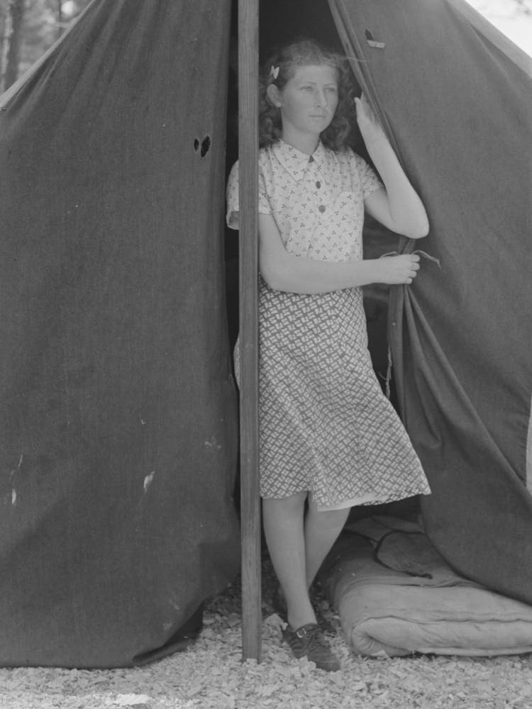 Daughter Of Migrant Strawberry Picker In Doorway Of Tent Home Near Hammond, Louisiana By Russell Lee