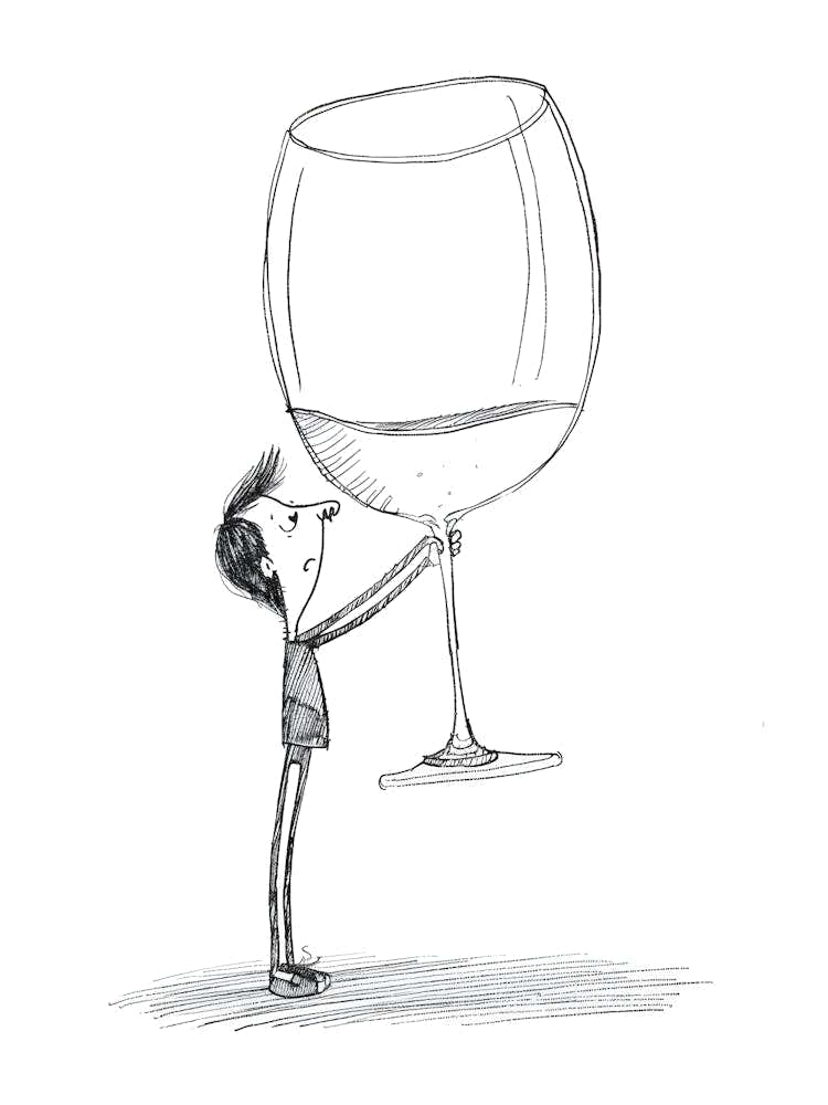 Man Holding A Wine Glass