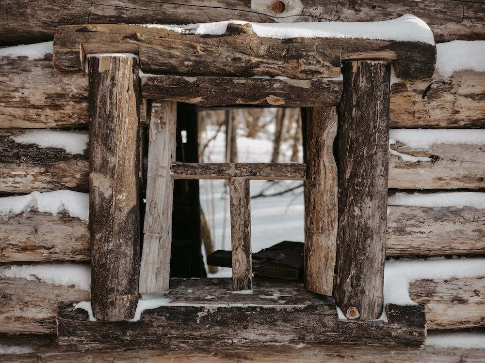 Snowy Log Cabin Window