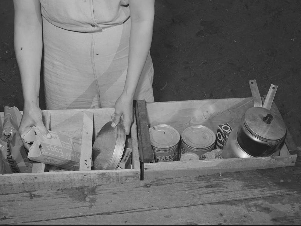 Carpenter S Wife Unpacking A Box Of Groceries, Mission Valley, California, Which Is About Three Miles From San