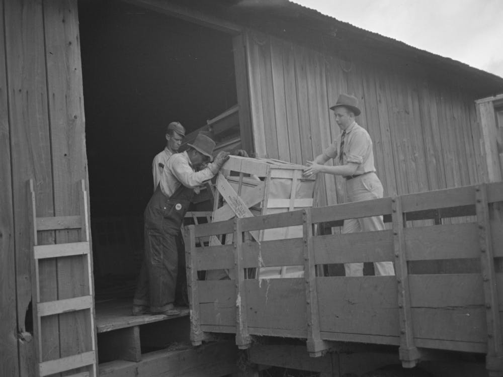 Southeast Missouri Farms, Loading Cook Stove On To Truck For Transporting To New Farm Unit By Russell Lee