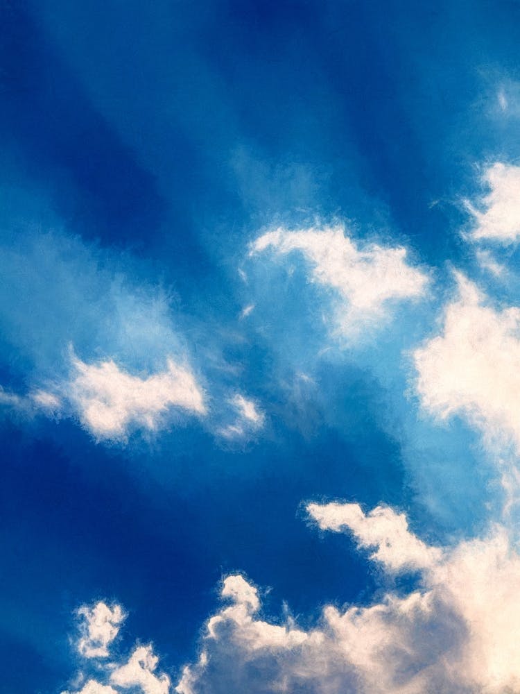 Shafts Of Light On Clouds