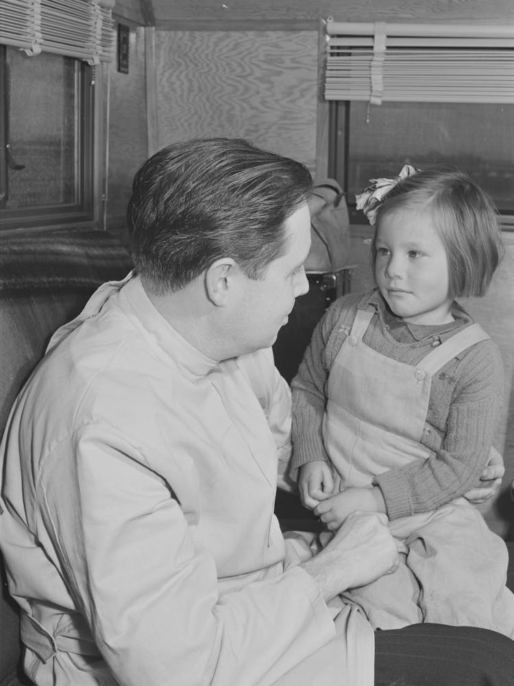 Fsa (Farm Security Administration) Dentist Reassures Migrant Child Who Is Making Her First Visit To A Dentist