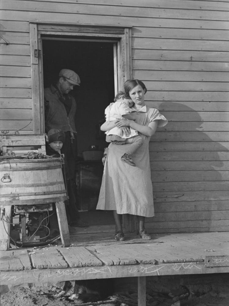 Mrs, Glen Cook And Baby With Mr, Cook In Background, Little Sioux Township, Woodbury County, Iowa By Russell Lee