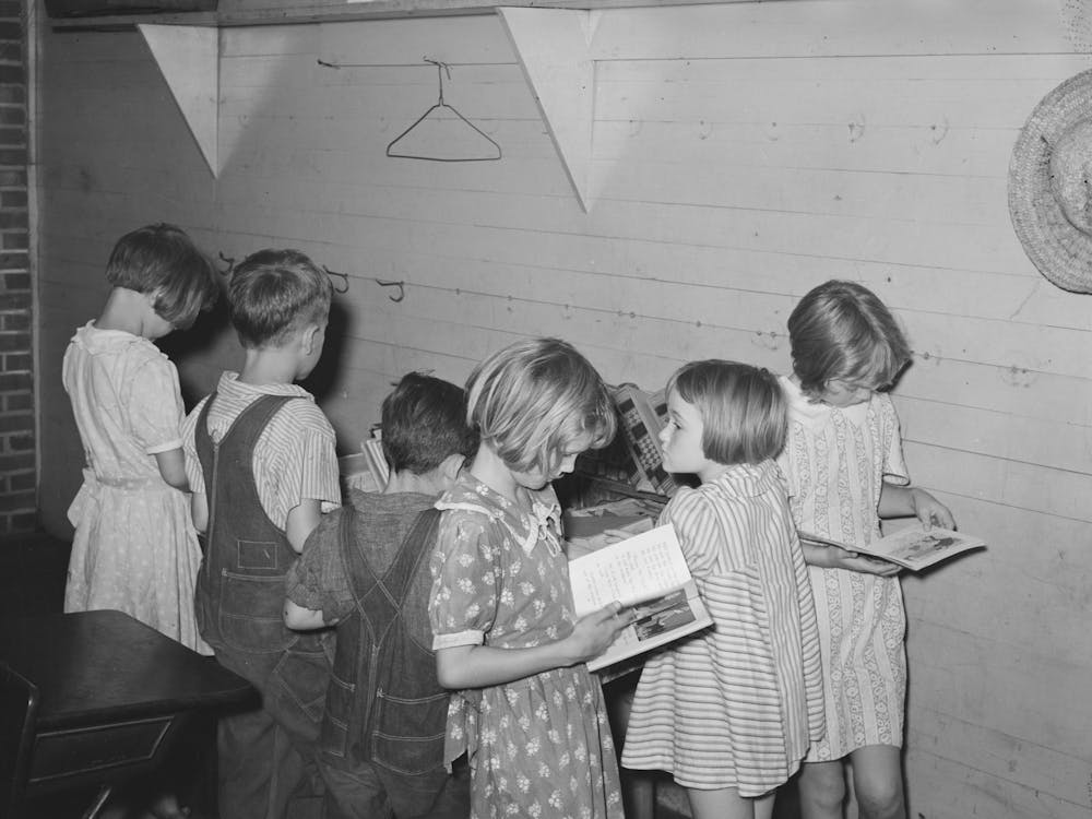 Children Choosing Books From The Small School Library Near La Forge, Missouri, Southeast Missouri Farms School By