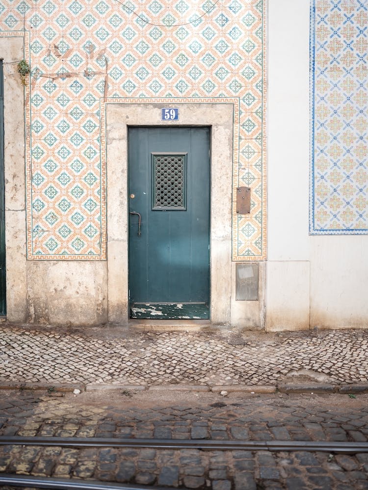 Dark Green Door And Portuguese Tiles