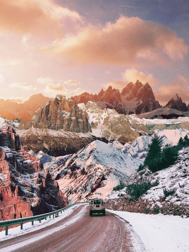 Jeep Driving Through Winter Landscape
