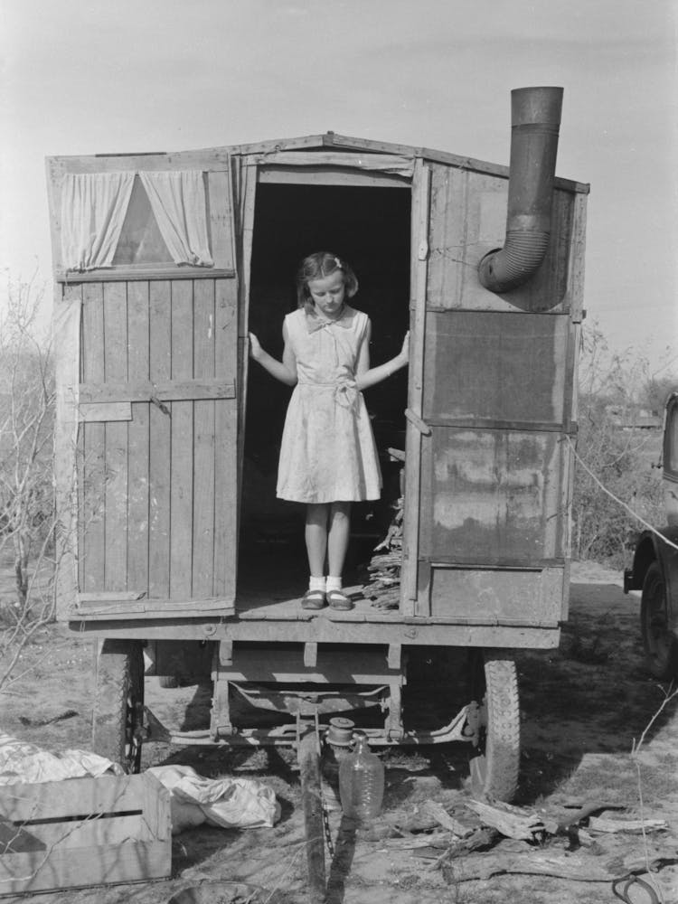 Untitled Photo, Possibly Related To Daughter Of Migrant In Doorway Of Trailer, Sebastin, Texas By Russell Lee