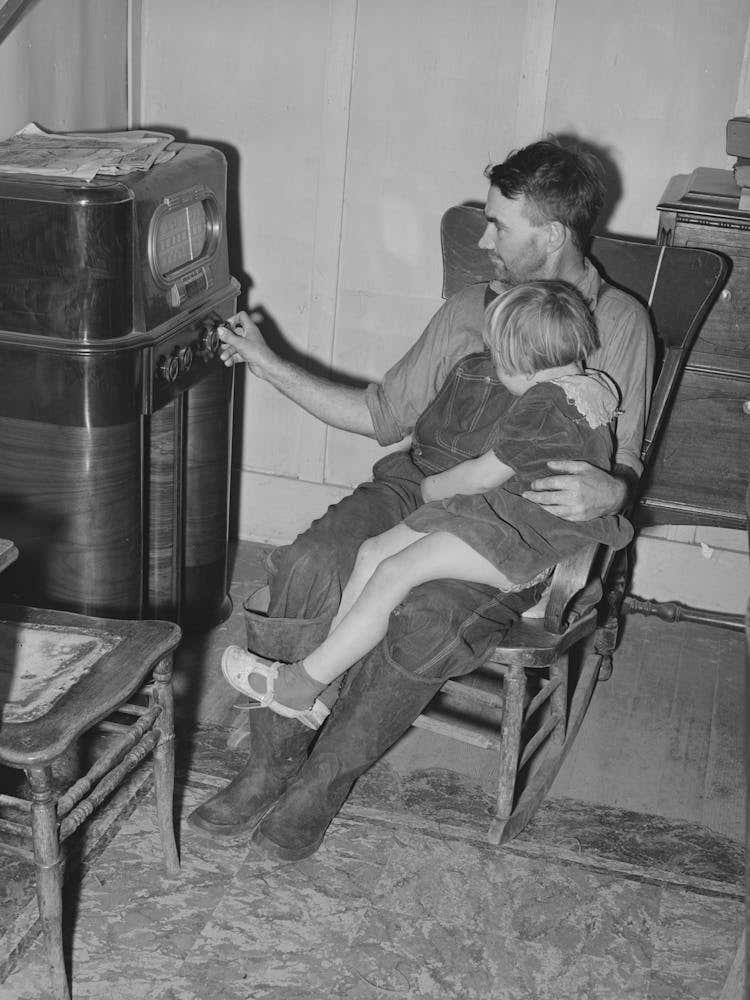 John Frost And Daughter Listening To Radio In Their Home, Tehama County, California By Russell Lee