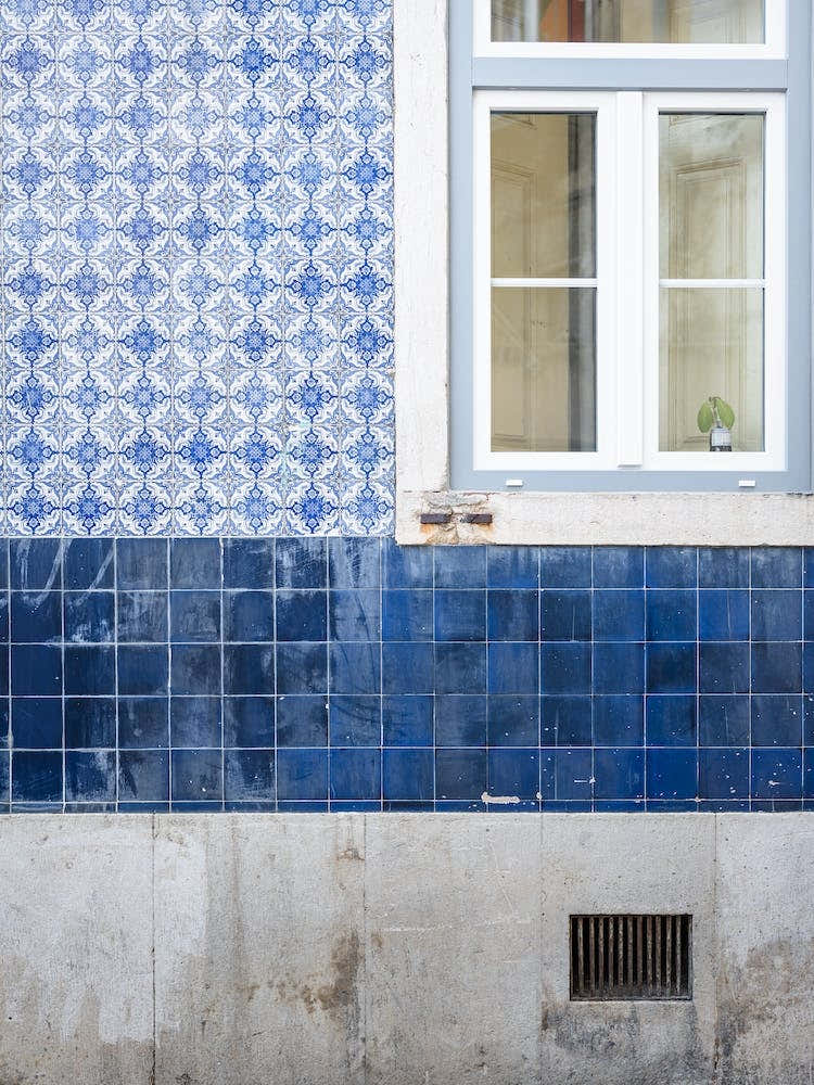 Blue Portuguese Ceramic Tiles And Colourful Wall At Alfama Lisboa