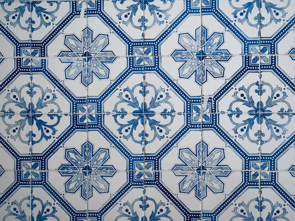 Vintage blue pattern on these tiles in Lisbon, Portugal - summer azulejos street and travel photography by Christa Stroo Photography