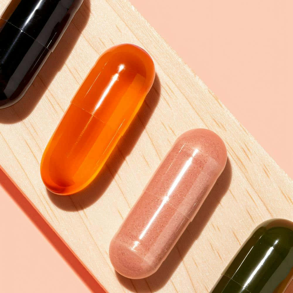 Four Pills On A Tray