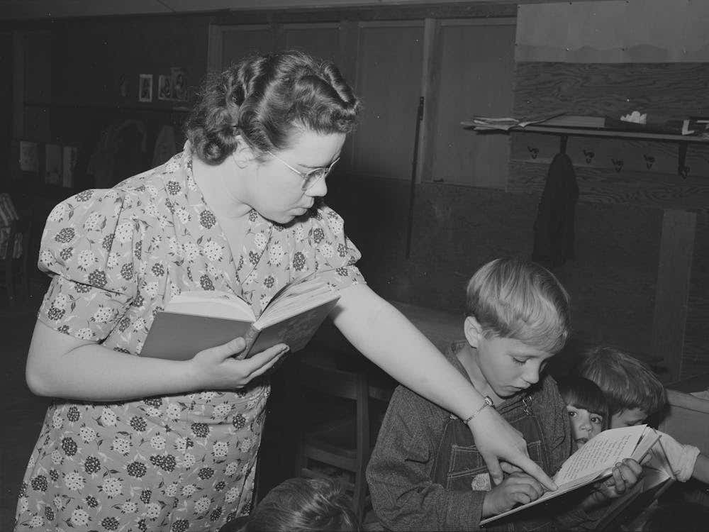 Teacher Helps Pupil With His Reading, Fsa (Farm Security Administration) Camp For Farm Workers, Caldwell,