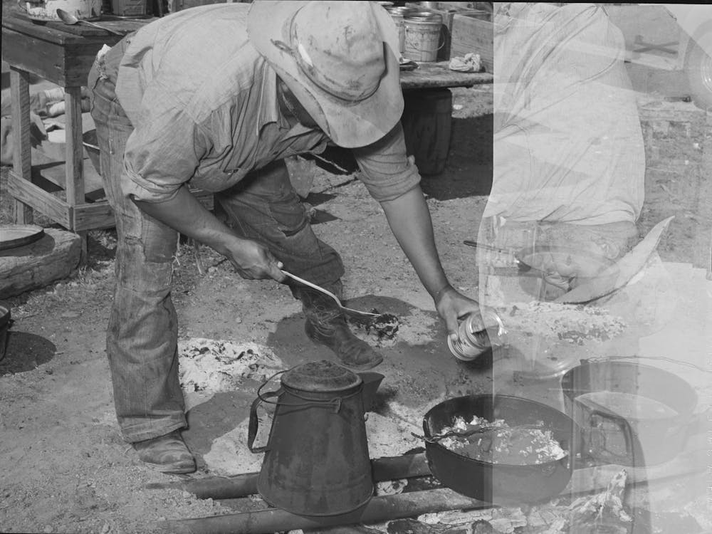 Untitled Photo, Possibly Related To Camp Cook At Work With Chuckwagon In Background, Cattle Ranch Near Marfa,