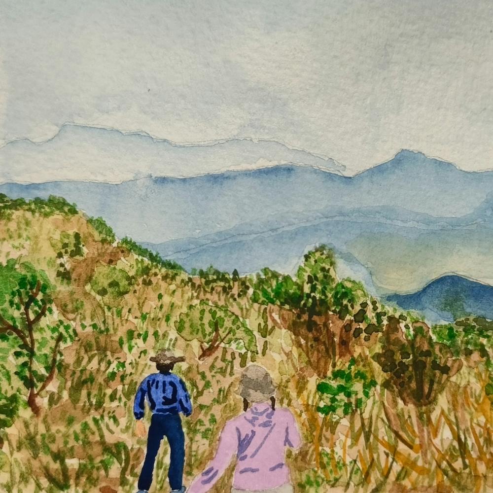 Two Hikers In The Mountains