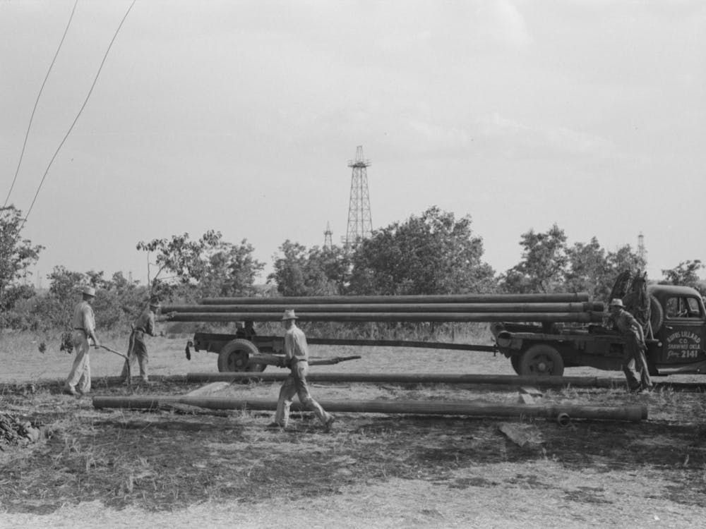 Untitled Photo, Possibly Related To Unloading Pipe From Truck At Oil Well, Seminole Oil Field, Oklahoma By Russe