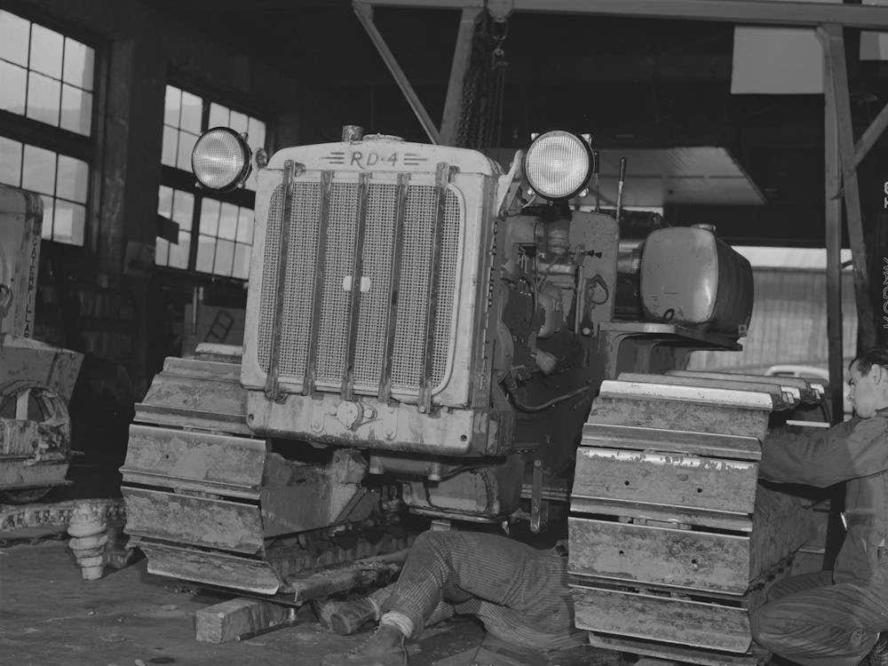 Caterpillar Tractor In Repair Shop At Colfax, Washington, These Tractors Are Used In The Wheat Lands By Russell Lee