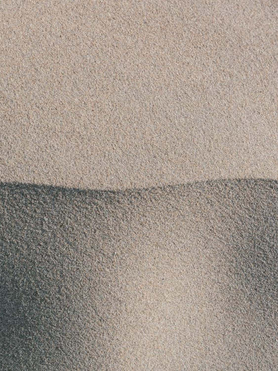 Abstract sand pattern in neutral tones - beige beach nature and travelphotography by Christa Stroo Photography