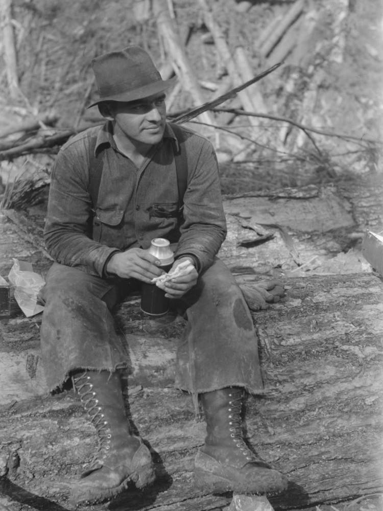 Lumberjack Eats Lunch, Long Bell Lumber Company, Cowlitz County, Washington By Russell Lee