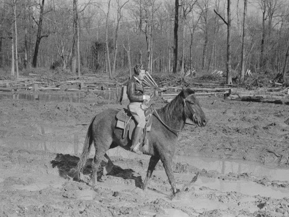 Home Supervisor Of Chicot Farms Project Must Ride Horseback To Get To And From Project, Arkansas By Russell
