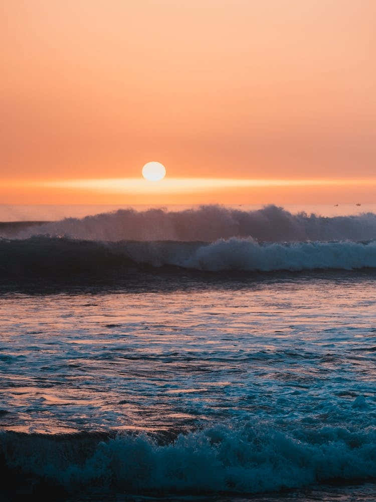 Misty sunset with waves | Morocco travel photography
