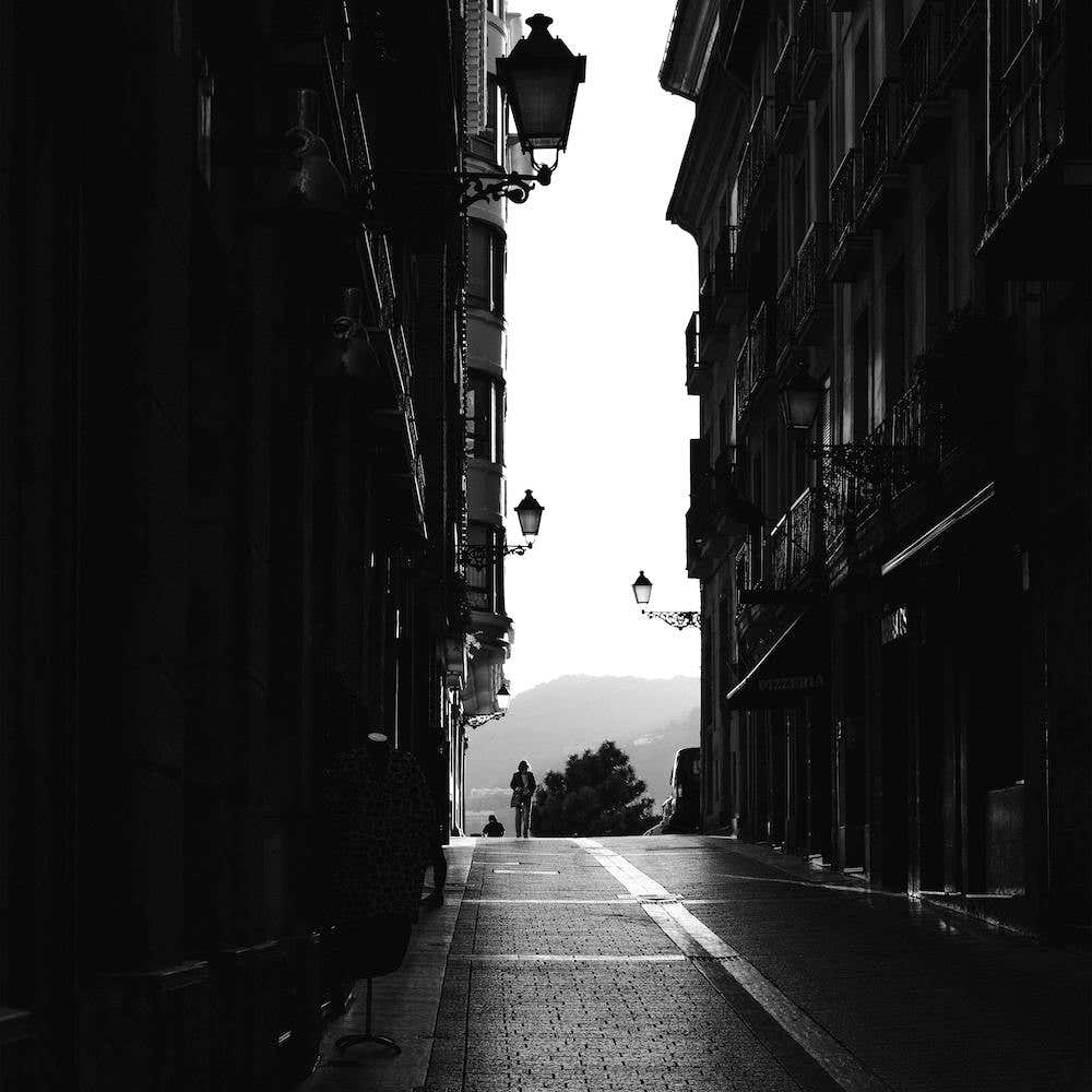Woman Walking In The Street, Black And White St Sebastian, Spain Square