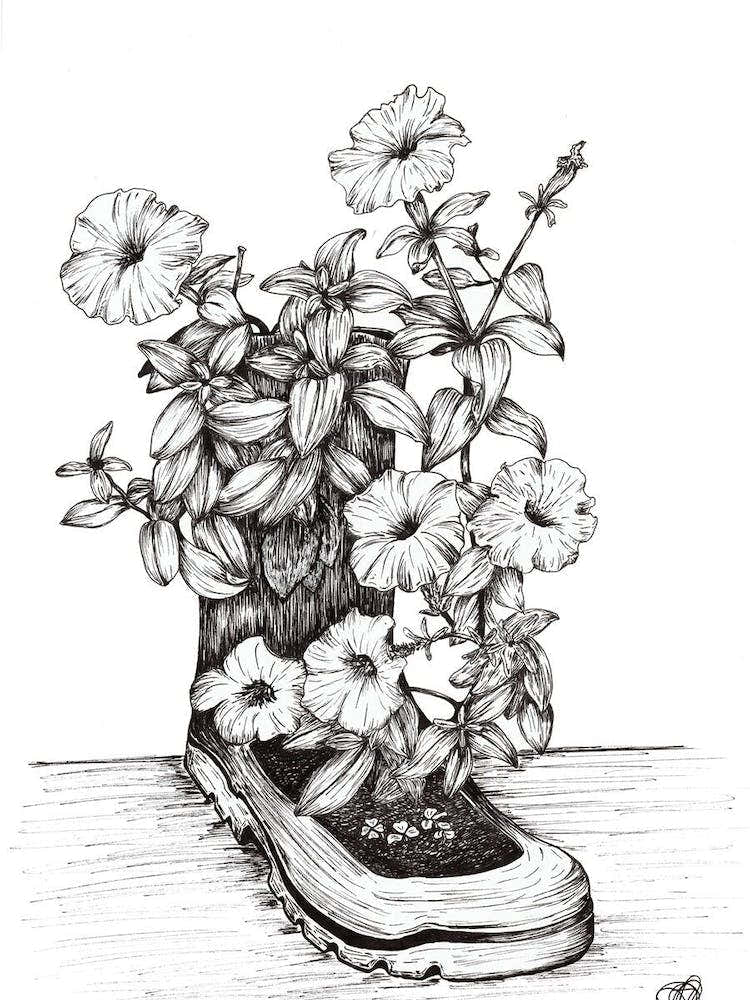 Black and White Flowers in a Boot