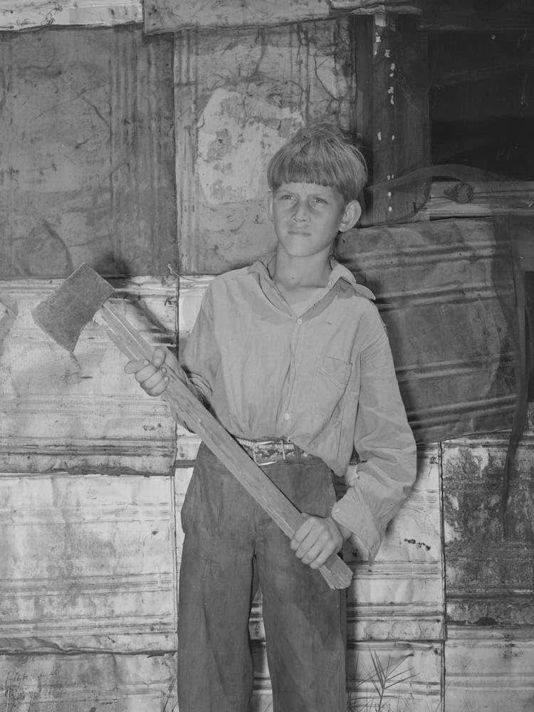 Boy Living In Mays Avenue Camp With Homemade Ax, Oklahoma City, Oklahoma, Refer To General Caption