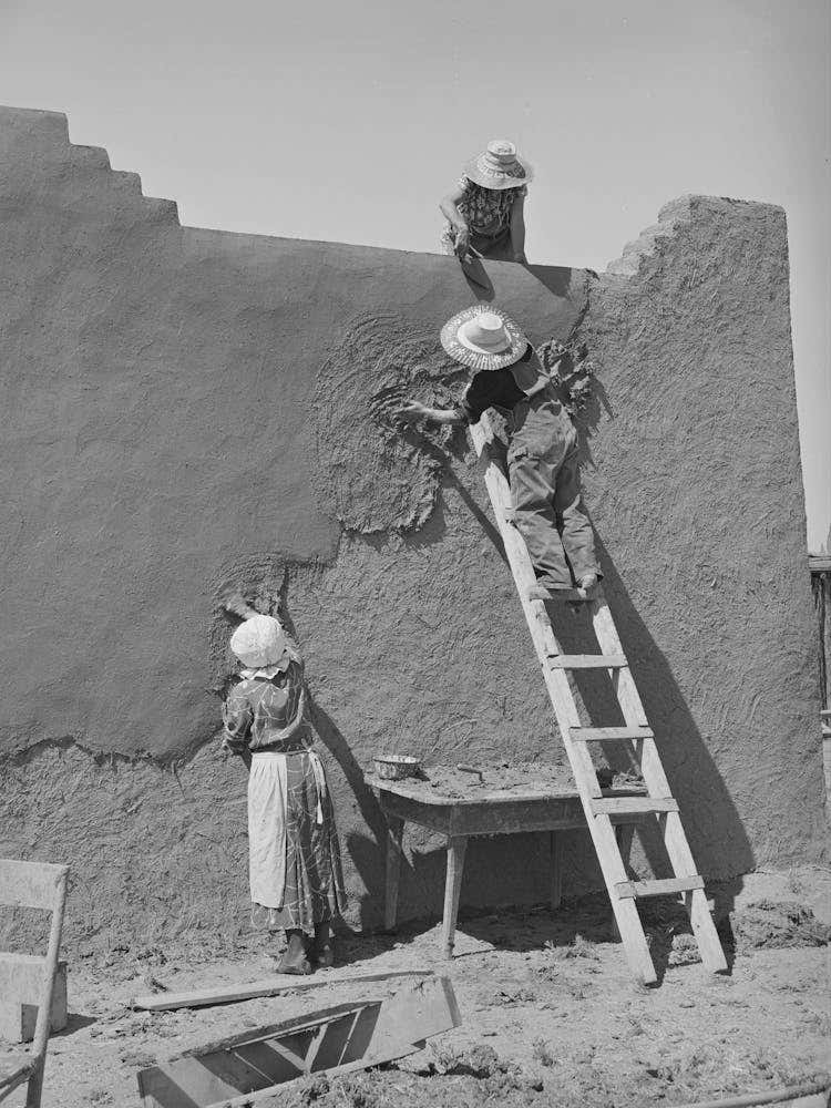 Once A Year The Women In The Spanish American Families Replaster The Adobe Houses, Neighboring Women Are Hired