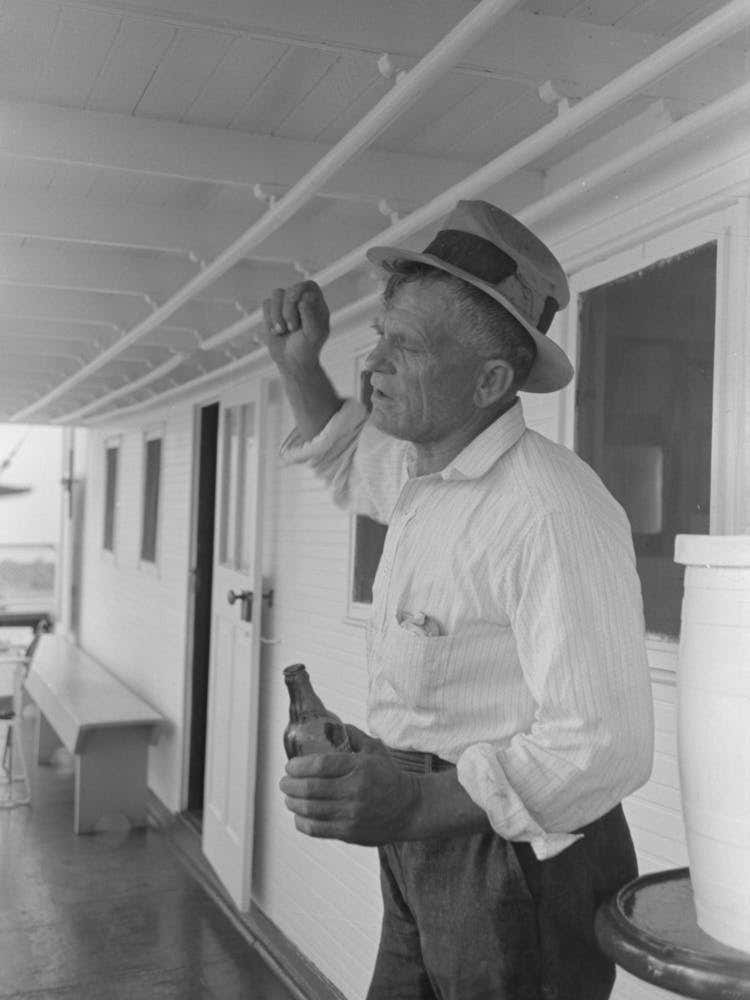 Oyster Fisherman Of Olga, Louisiana, Aboard El Rito, Captain Of This Boat Gives Free Beer To Fishermen On His Stops