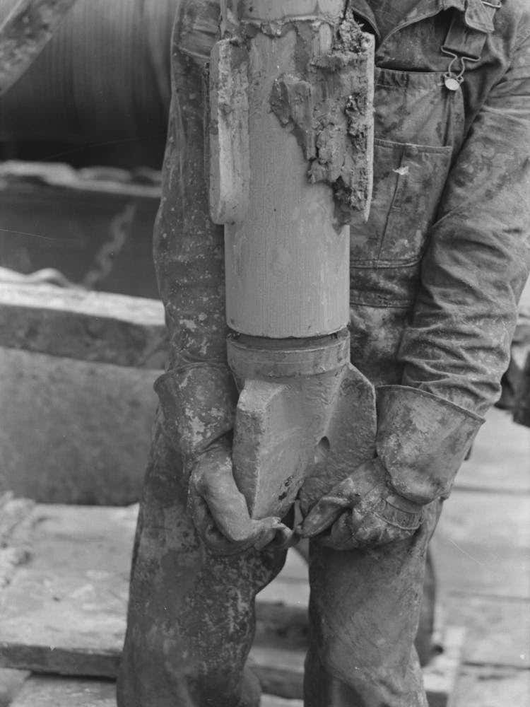 Oil Field Worker Holding Bit, Oil Well, Kilgore, Texas By Russell Lee