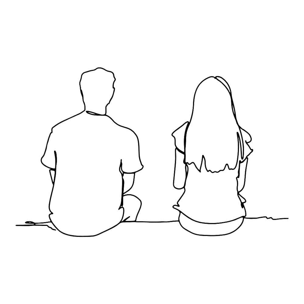 Couple Sitting On Bench
