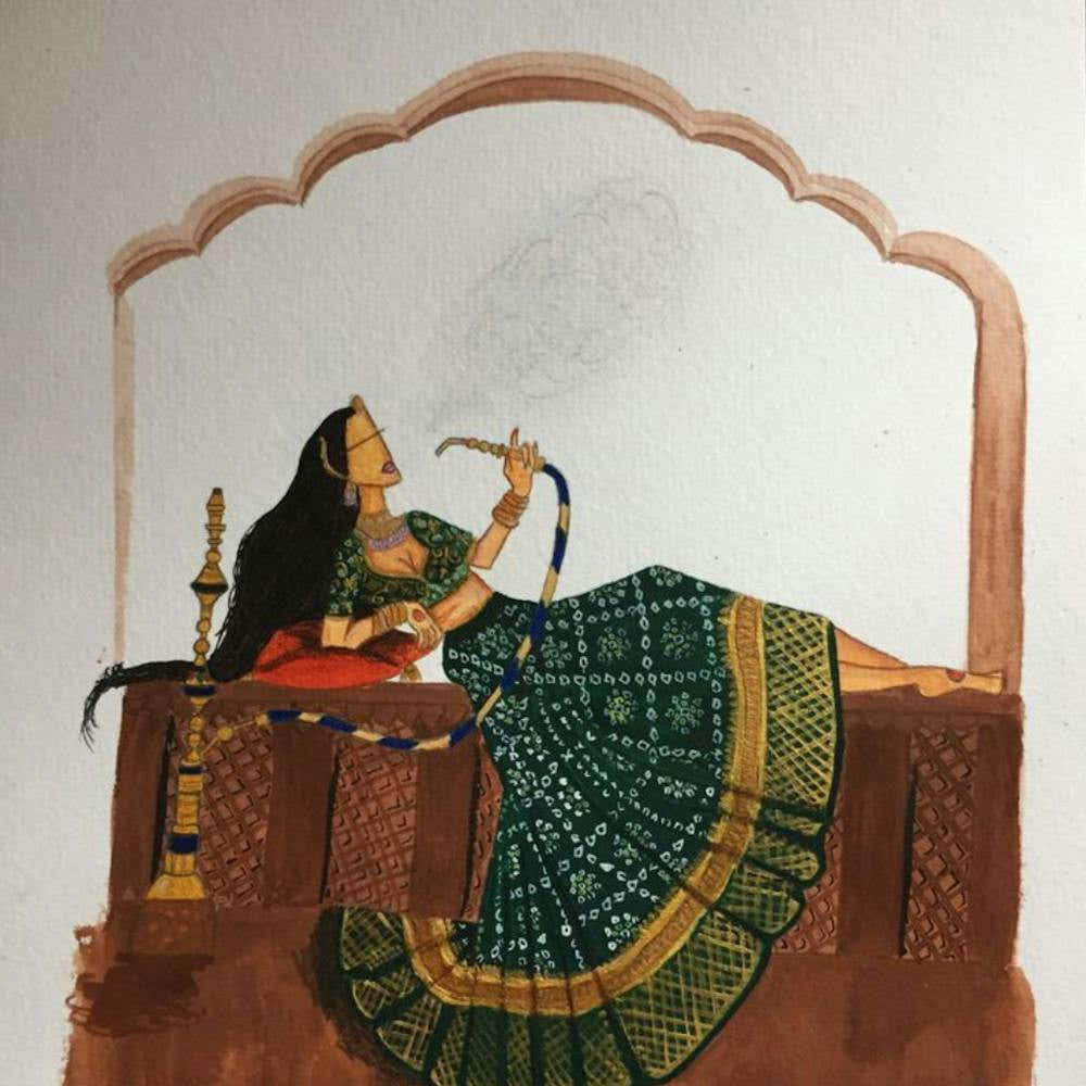 Indian Woman Smoking A Pipe