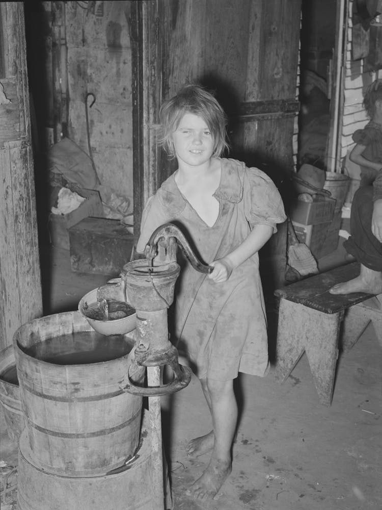 Child Drawing Water,Camp Near Mays Avenue, Oklahoma City, Oklahoma, See General Caption 21 By Russell Lee