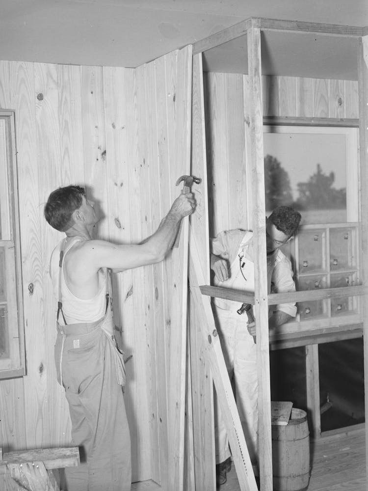 Southeast Missouri Project Field, House Erection, Finishing Interior Walls With Vertical Boards, Note Wind Bracing In