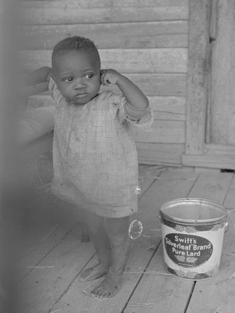 Young Son Of Sharecropper Family, New Madrid County, Missouri By Russell Lee