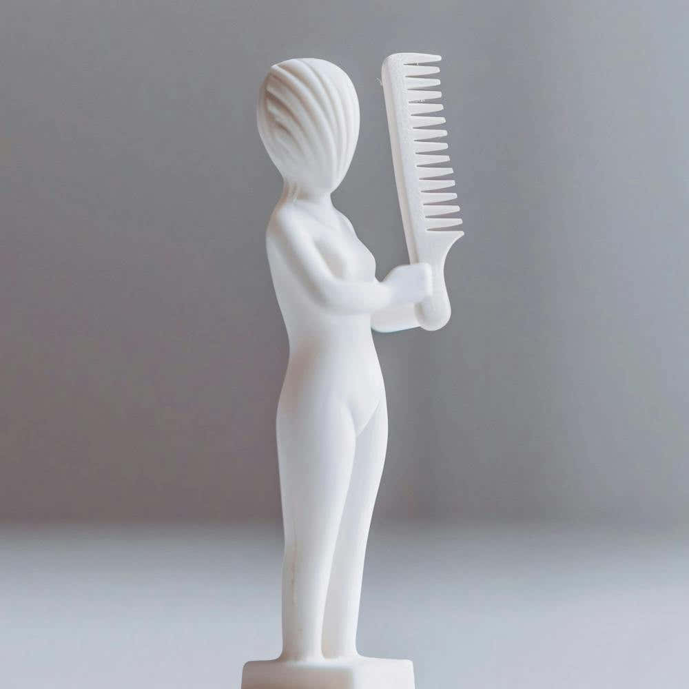 Woman Holding A Comb