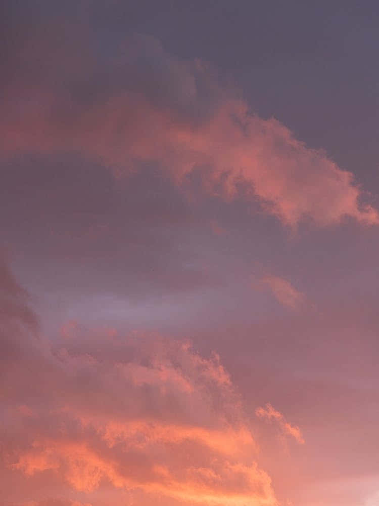 Orange and purple sunset sky in Portugal - bright clouds - summer nature and travel photography by Christa Stroo Photography