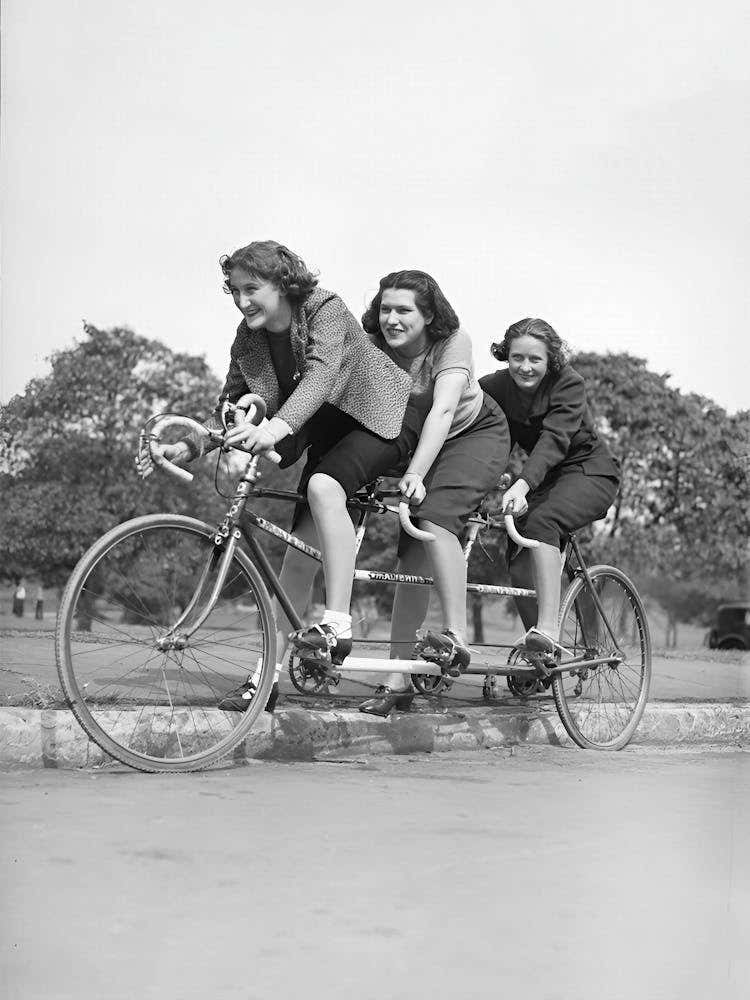 Three Women On A Bicycle, Vintage Black and White Old Photo