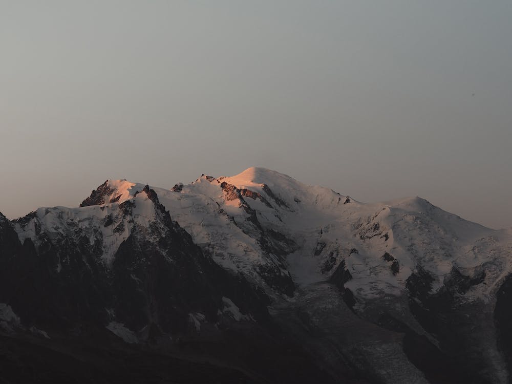 Dusk Over Snowy Peak