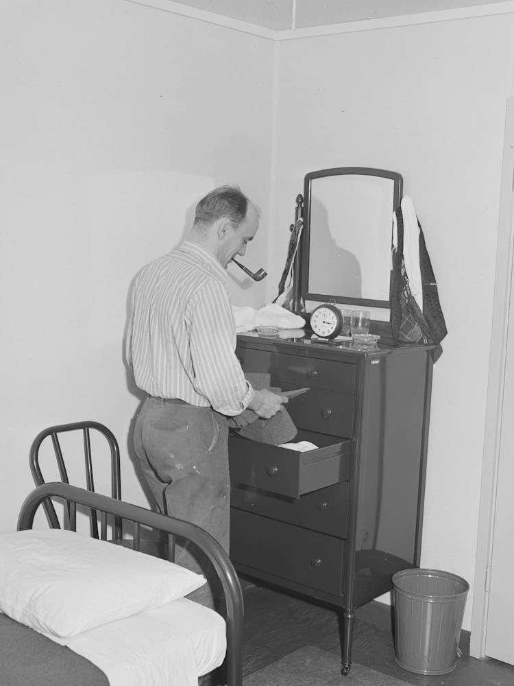 Workman At The Navy Shipyards, Bremerton, Washington, In His Room At The Fsa (Farm Security Administration