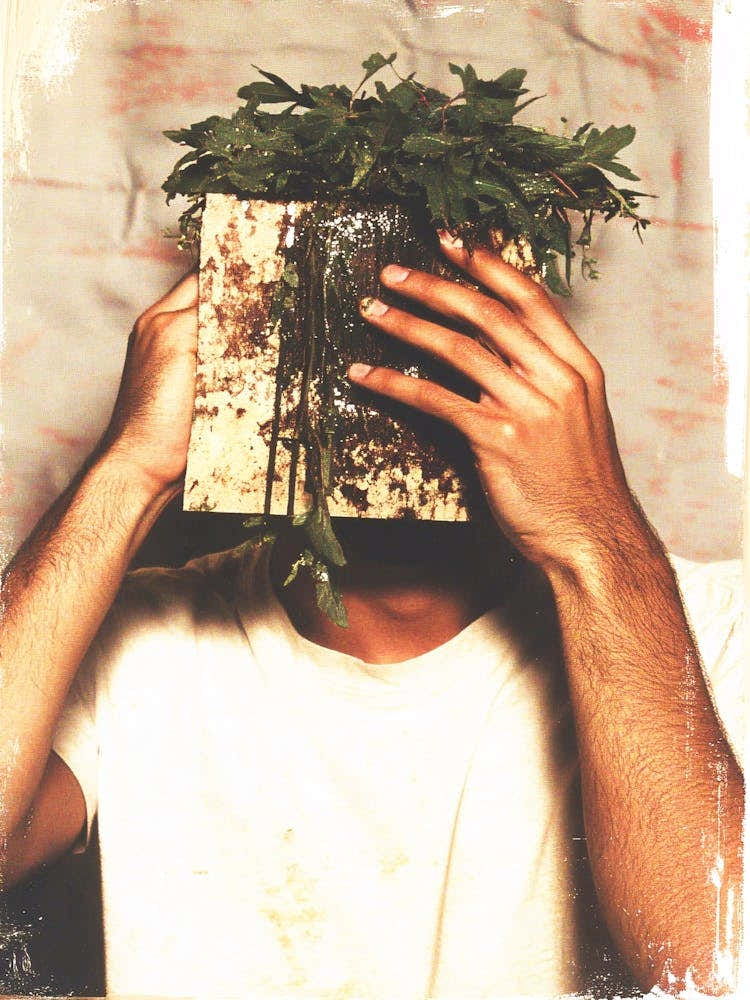 Man With A Book On His Head