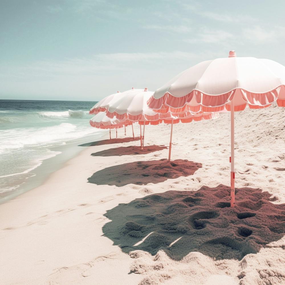 Pink Umbrellas On The Beach