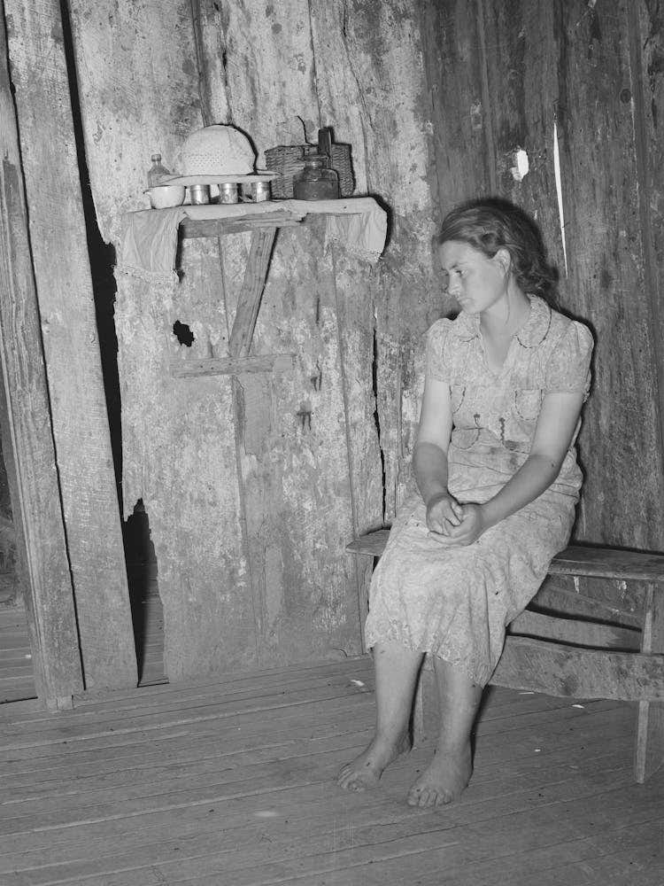 Agricultural Day Laborer Sitting In Corner Of One Room Of Her Two Room Shack Home Near Webbers Falls, Oklahoma
