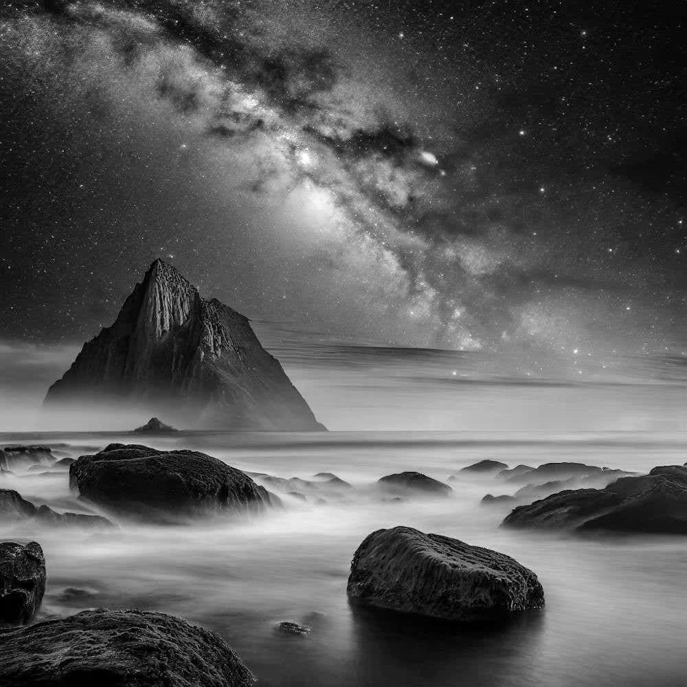 Shot Of The Milky Way Above The Ocean With Rocks And Green Algae