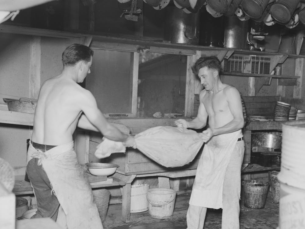 Cooks Drying Silverware In Logging Camp Near Effie, Minnesota By Russell Lee