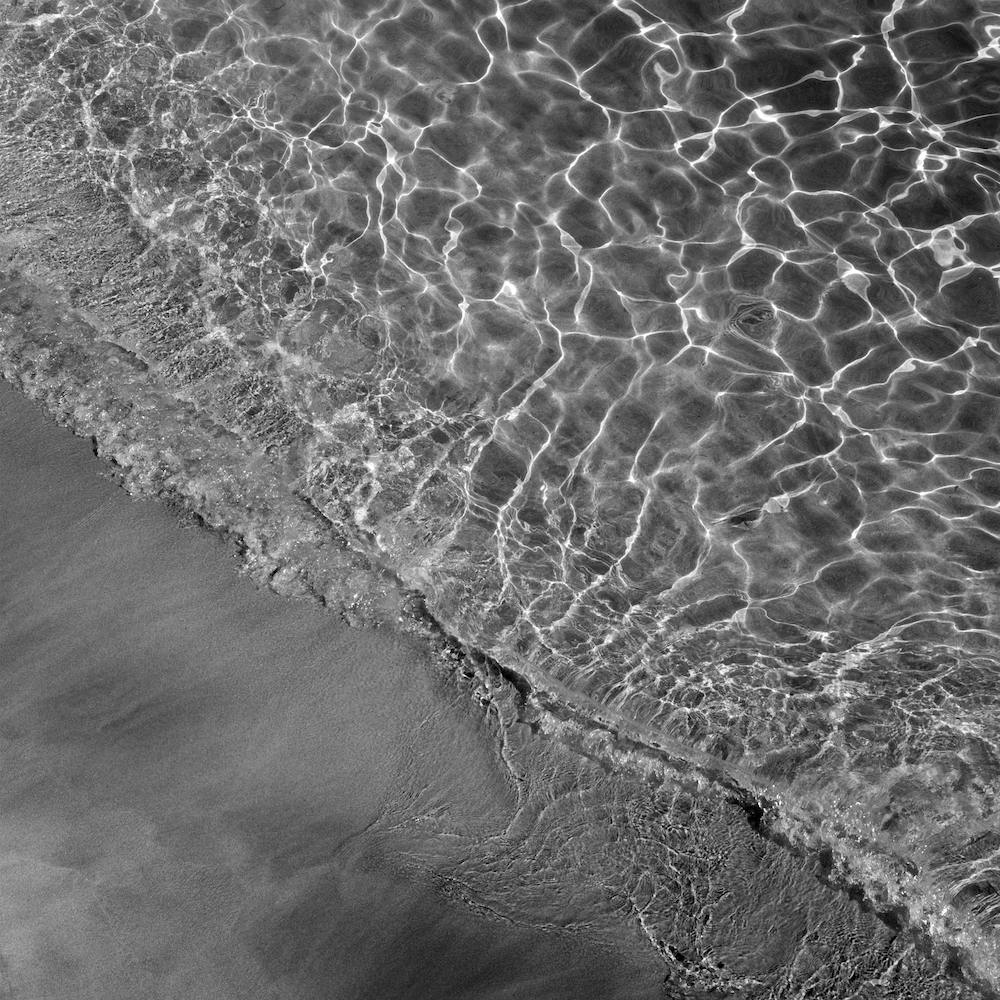 Where Sand And Water Meet Black And White Square