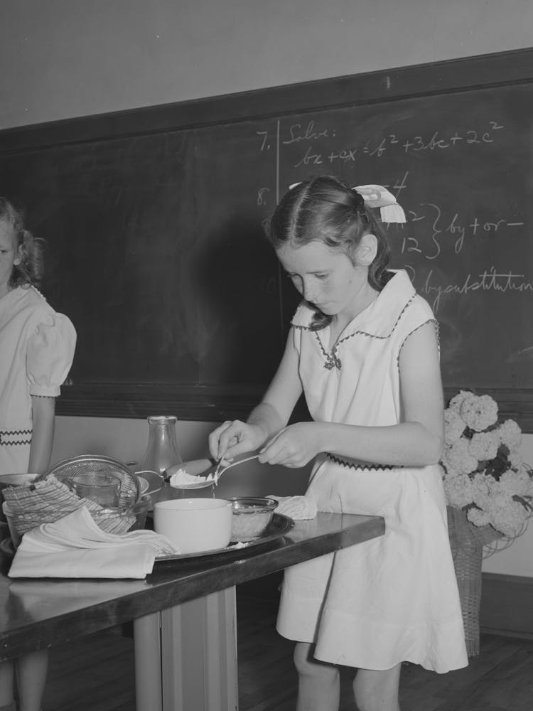 Schoolgirl Demonstrating Cooking Methods At The 4 H Club Spring Fair, Adrian, Oregon By Russell Lee