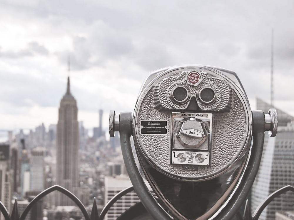 New York, USA I Manhattan skyline in grey black and white photography of Manhattan view from Rockefeller center building rooftop on the vastness of the Big Apple in an apocalyptic atmosphere moody aesthetic